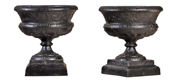 PAIR OF THREE PART CAST IRON GARDEN URNS BY KRAMER BROTHERS OHIO C 1900.