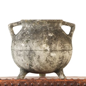 A CAST STONE FRENCH HANDLED GARDEN POT WILLY GUHL
