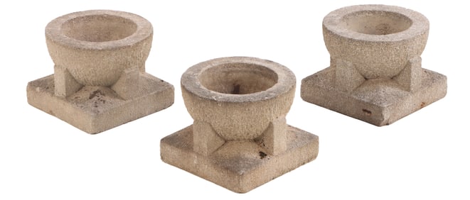 A SET OF THREE ART DECO CAST STONE GARDEN PLANTERS CIRCA 1930