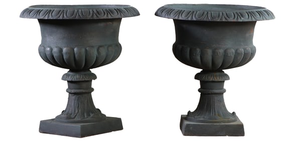 A PAIR OF 26" PAINTED CAST IRON GARDEN URNS.