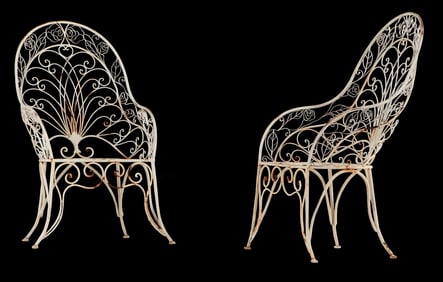 PAIR OF IRON FAN BACK CHAIRS.