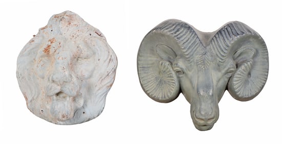 TWO LEAD WALL HUNG MASKS OF A LION AND A RAM.