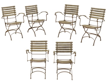 SIX FRENCH WROUGHT IRON AND WOOD FOLDING ARM CHAIRS.