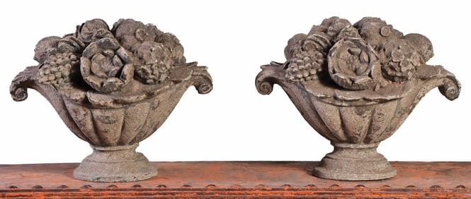 A PAIR OF CAST STONE CORNUCOPIA.