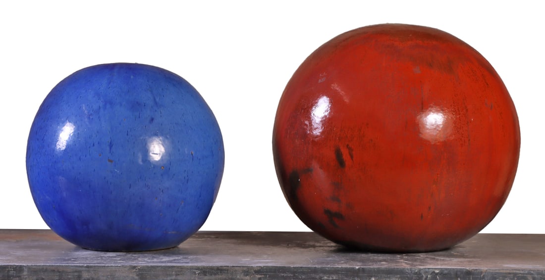 A LOT OF TWO GLAZED EARTHENWARE TERRACOTTA SPHERES. (1 of 5)