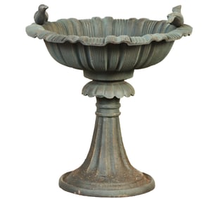 A 24" CAST IRON BIRD BATH HAVING TWO BIRDS PERCHED ON THE RIM.