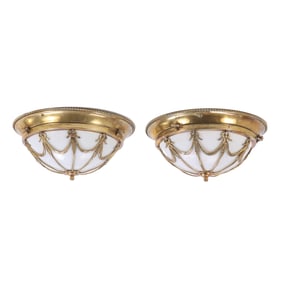 A PAIR OF NEOCLASSICAL STYLE BRASS CHANDELIERS HAVING OPALINE GLASS.