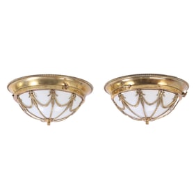 A PAIR OF NEOCLASSICAL STYLE BRASS CEILING MOUNT LIGHT FIXTURES HAVING OPALINE GLASSS.