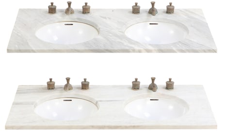A PAIR OF MATCHING MARBLE DOUBLE SINKS HAVING VINTAGE SHERLE WAGNER HARDWARE.