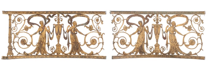 A PAIR OF EXQUISITE ART NOUVEAU GILT PAINTED WROUGHT IRON RAILING PANELS EACH HAVING URN