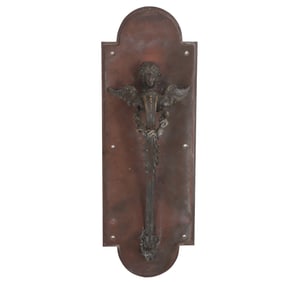 A LARGE 19TH CENTURY BRONZE DOOR HANDLE IN THE FORM OF A WINGED ANGEL
