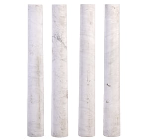 A SET OF FOUR MATCHING ROUND  MARBLE COLUMNS.