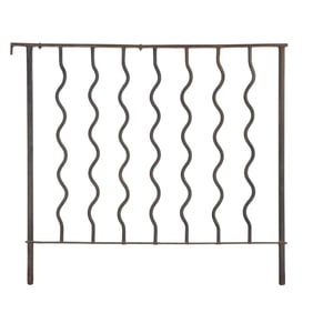 A WROUGHT IRON GATE WITH SQUIGGLY RAILS.