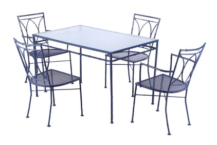 ELEGANT FIVE PIECE FAUX BAMBOO IRON TABLE AND CHAIR SET HAVING A GLASS TOP.