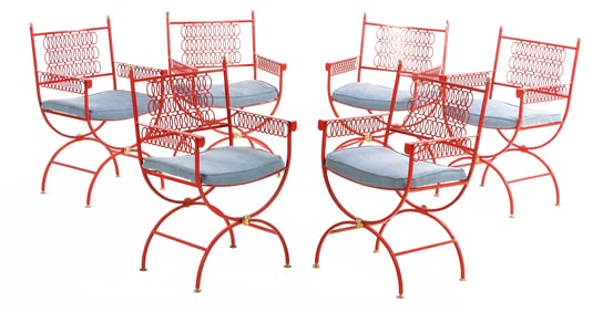 A SET OF SIX PAINTED IRON AND BRASS CERULE FORM ARM CHAIRS WITH REPEATING DESIGN AND UPHOLSTERED