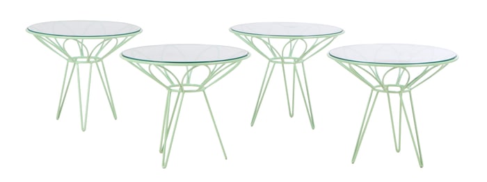 A SET OF FOUR PAINTED GREEN IRON AND GLASS GARDEN OR DECK TABLES IN THE MANNER OF RUSSELL WOODARD