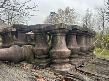 A RARE SET OF ONE HUNDRED FIFTY GRANITE BALUSTRADES IN THE NEOCLASSICAL TASTE.