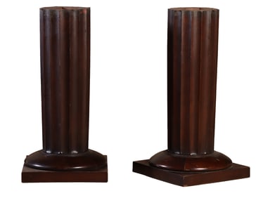 A PAIR OF FLUTED ARCHITECTURAL WOOD COLUMNS.