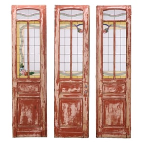 A BELGIAN THREE PART ART NOVEAU STAINED AND LEADED GLASS DOOR SYSTEM C 1910.