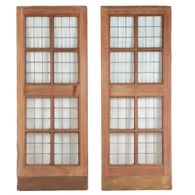 A PAIR OF ANTIQUE ENGLISH MAHOGANY LEADED GLASS DOORS WITH BRASS KICK PLATES CIRCA 1910, REMOVED