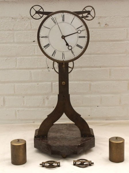 MACHINED TOWER CLOCK 2ND HAND MOVEMENT: A heavily machined "tower clock" having second hand and fusee driven movement, all atop octagonal marble base circa 1910. Ht: 29" Width: 12" Depth: 12"