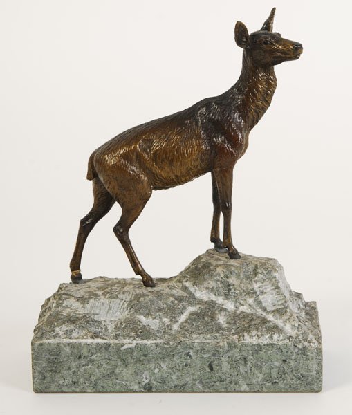 ANTIQUE BRONZE DEER ON GRANITE BASE CIRCA 1920: An antique bronze deer atop granite base circa 1920. Ht: 7" Width: 5" Depth: 3"