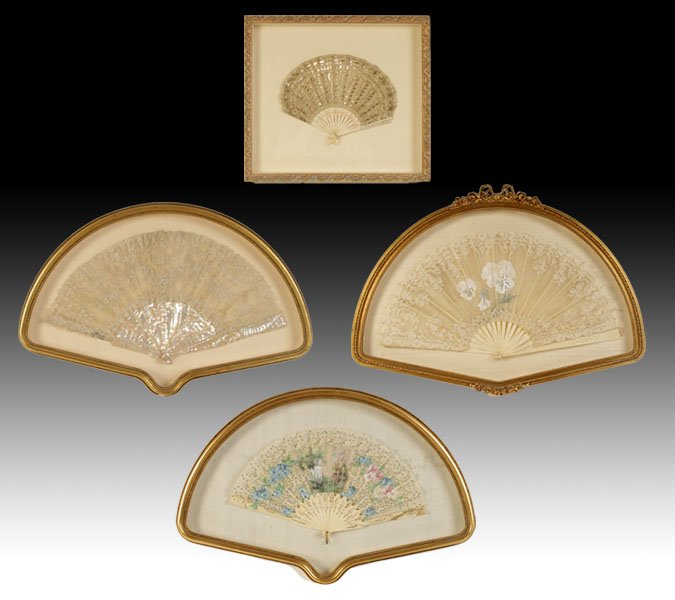 4 ANTIQUE LACE HAND FANS IN SHADOW BOXES C. 1900: A grouping of four antique lace hand fans having mother of pearl decorated bone ribs mounted in decorative shadow boxes circa 1900. Ht: 23" Width: 32" Depth: 2" (Largest)