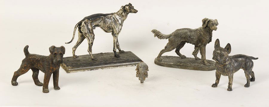 5 WHITE METAL STATUES OF DOGS CIRCA 1930: A group of five white metal dog statues including and Airdale, French Bulldog, Greyhound and two Setters circa 1930. Ht: 9" Width: 12" Depth: 5" (Largest)