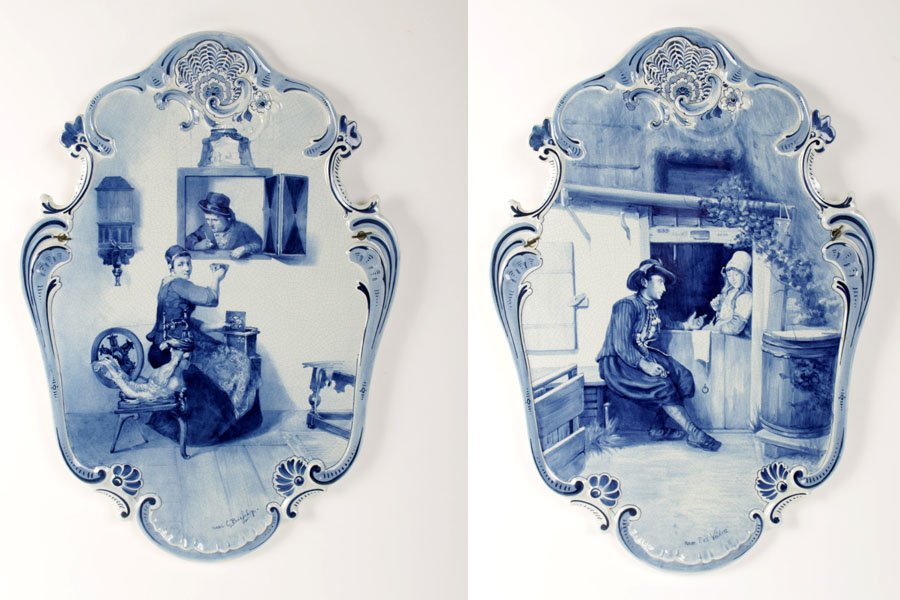 PAIR LARGE ROMANTIC DELFT PORCELAIN PLAQUES: A pair of large romantic delft porcelain plaques, one signed by C. Bisfchop, the other signed by P.V.D. Velden. Ht: 21" Width: 15" Depth: 1"