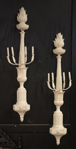 PAIR LARGE CARVED WOOD 4 ARM WALL SCONCES: A pair of monumental carved wood four arm wall sconces having acanthus leaf decoration and flame finials, and a pair of carved corbels circa 1940. Ht: 56" Width: 13" Depth: 8"
