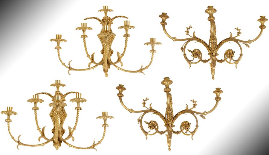 GROUP SCONCES 3 ARM SCONCES FRENCH 6 ARM: A group of sconces to include a matched pair of three arm bronze wall sconces and a pair of French inspired bronze sconces having twisted arms.