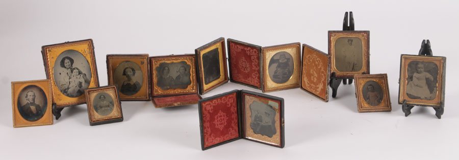 14 PIECE LOT DAGUERREOTYPE IMAGES & LOCKET 1870: Fourteen piece lot featuring daguerreotype and other images along with a Gutta-percha locket in fair condition dated 1870-1903. Ht: 1.75" Width: 1.5" (Largest)