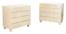 A PAIR OF EIGHT DRAWER PARCHMENT COVERED DRESSERS C 1960 IN THE MANNER OF SAMUEL MARX.