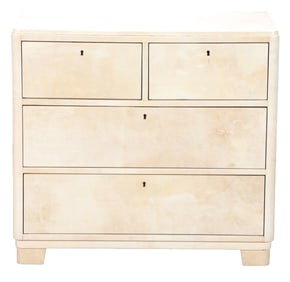 FOUR DRAWER PARCHMENT COVERED DRESSER IN THE MANNER OF SAMUEL MARX C 1945.