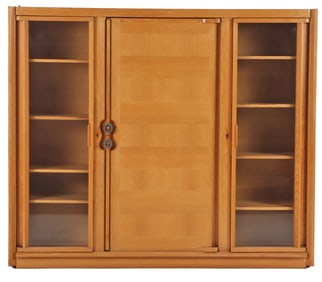 FRENCH OAK THREE DOOR BOOKCASE BY GUILLERME AND CHAMBRON HAVING CERAMIC HANDLES C 1970. DISMANTLES