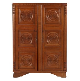 FRENCH TWO DOOR OAK CABINET WITH CIRCULAR DESIGN ATTRIBUTED TO CHARLES DUDOUYT C 1940.