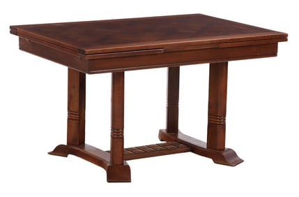 FRENCH OAK DINING TABLE IN THE MANNER OF CHARLES DUDUOUYT C 1940 HAVING TWO PULL OUT LEAVES.