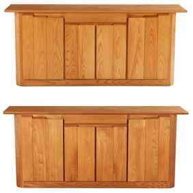 A PAIR OF ELM SIDEBOARDS BY MAISON REGAIN C 1970.