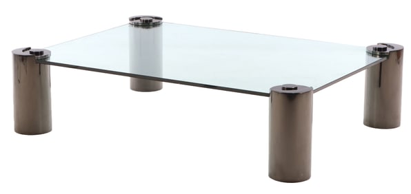 A LARGE GLASS AND STEEL COFFEE TABLE BY KARL SPRINGER.