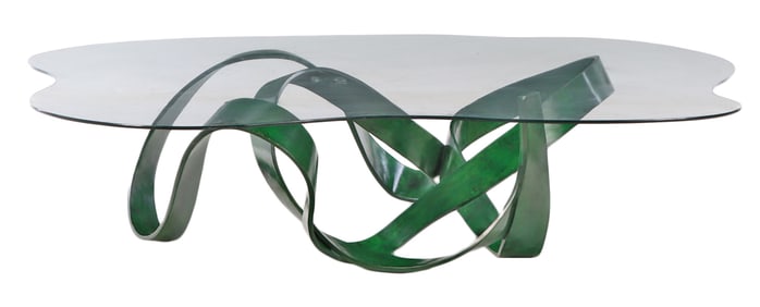 UNUSUAL BENT AND BURL WOOD GLASS TOP COFFEE TABLE IN A GREEN FINISH.