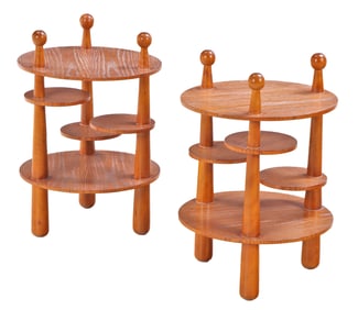 PAIR OF CERUSED OAK TABLES IN THE MANNER OF JEAN ROYERE WITH SWING OUT DISCS FOR DRINKS.