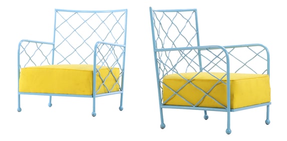 PAIR PAINTED IRON ARM CHAIRS HAVING WOVEN DESIGN AND LOOSE CUSHIONS IN THE MANNER OF JEAN ROYERE.