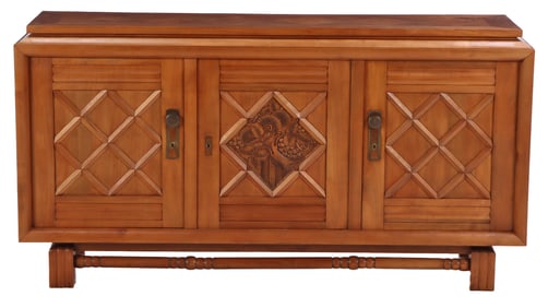 FRENCH ART DECO SYCAMORE SIDEBOARD HAVING STYLIZED FRUIT CARVING AND AN ARCHITECTURAL DESIGN C 1935.