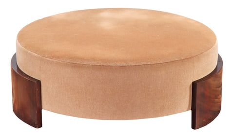 AN OVERSIZED ART DECO STYLE WALNUT UPHOLSTERED POOF.