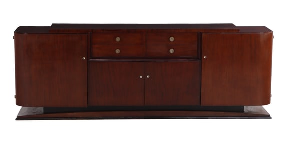 LARGE RIBBON MAHOGANY FRENCH ART DECO SIDEBOARD C 1930 HAVING FOUR DOORS AND FOUR DRAWERS RESTING ON