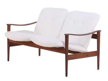 DANISH STYLE UPHOLSTERED SETTEE IN THE MANNER OF FINN JUHL C 1955 HAVING NEW FABRIC.