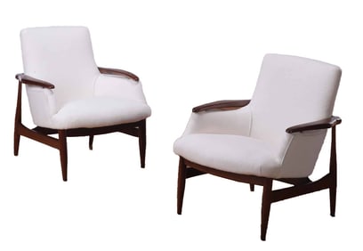 PAIR WALNUT LOUNGE CHAIRS IN THE MANNER OF FINN JUHL C 1950 HAVING NEW FABRIC.