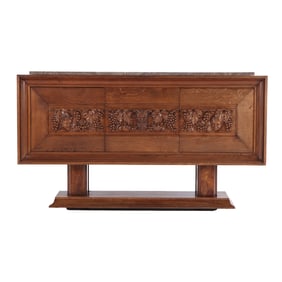 FRENCH OAK MARBLE TOP SIDEBOARD HAVING THREE DOORS AND A BAND OF CARVED GRAPES AND SATRY MASKS IN