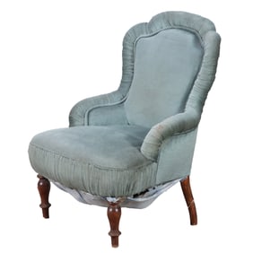 A FRENCH TURKISH STYLE NAPOLEON III LIBRARY CHAIR HAVING TURNED WALNUT LEGS C 1860.