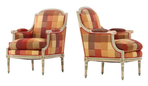 A PAIR OF FRENCH LOUIS XVI STYLE CARVED AND PAINTED BERGERE CHAIRS HAVING BRIGHTLY COLORED